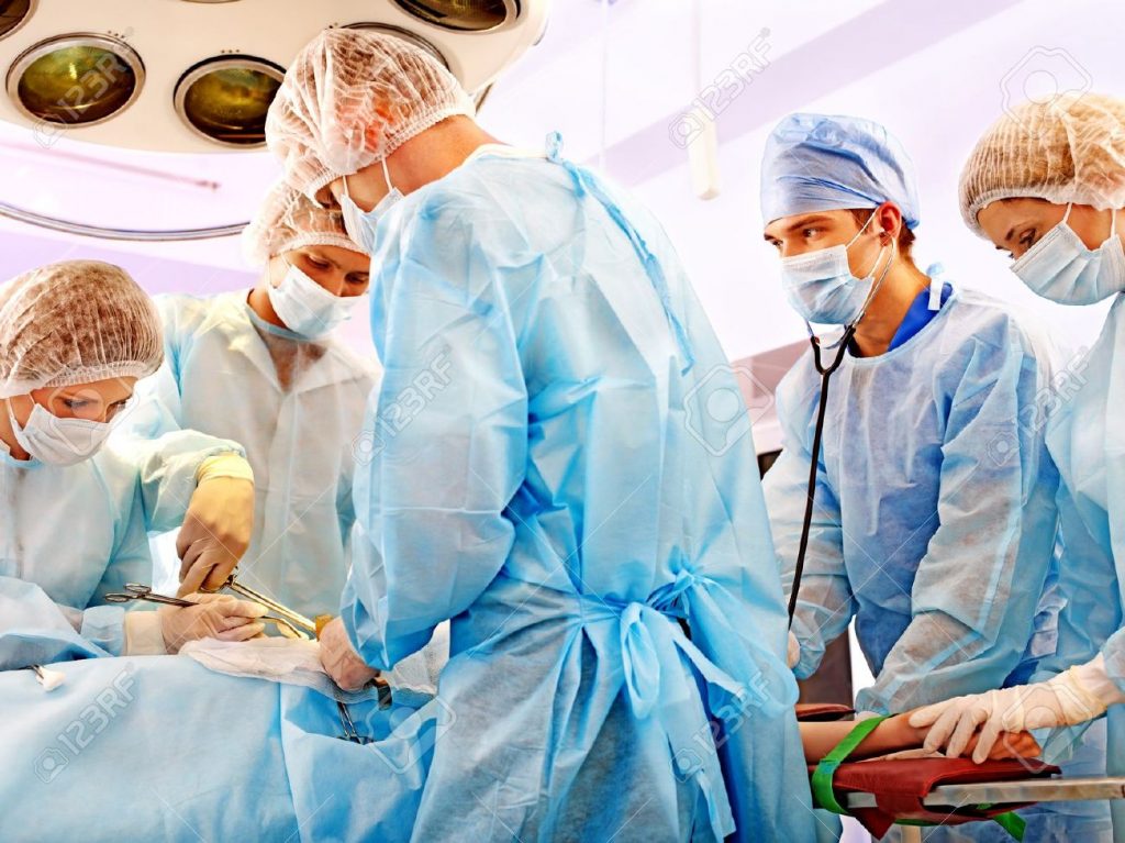 14530791-Team-surgeon-at-work-in-operating-room--Stock-Photo-surgery